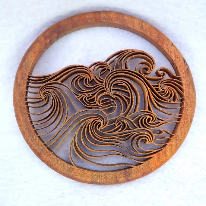 Abstract waves plaque cut from wood