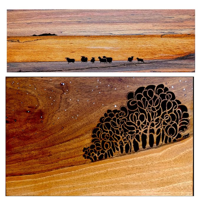 A pair of wooden pictures featuring a landscape with silhouettes of sheep and intricately carved trees.