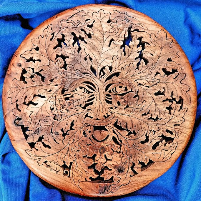 Green man wooden plaque