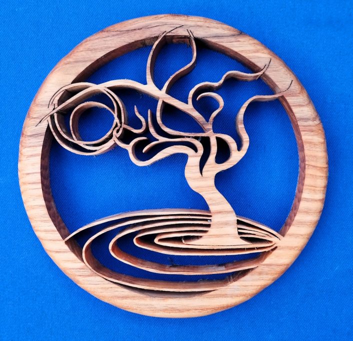 Abstract tree design cut from wood